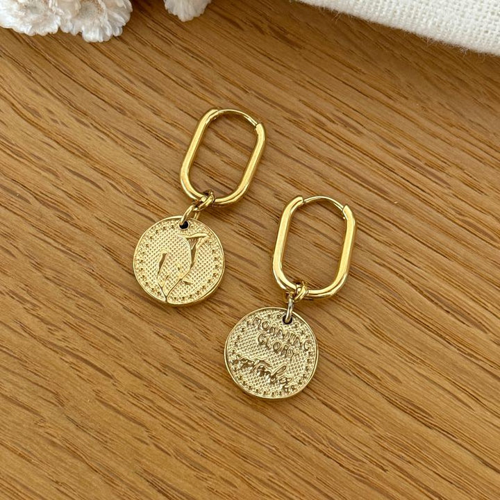 Birth flower earrings in steel