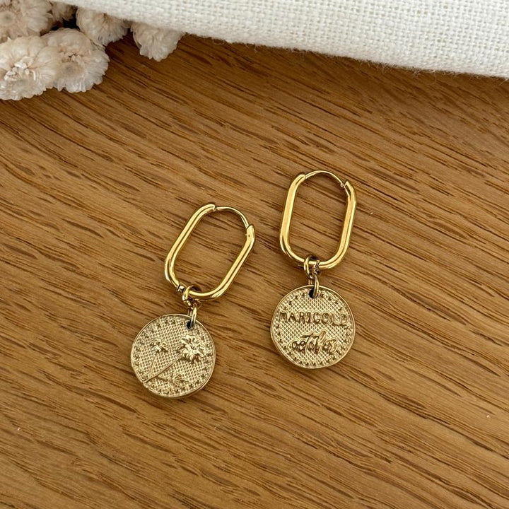 Birth flower earrings in steel