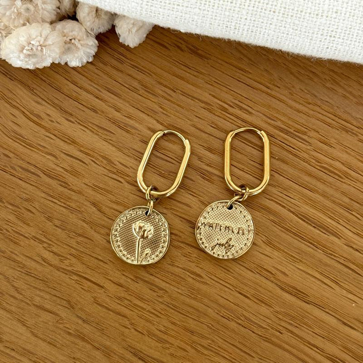 Birth flower earrings in steel