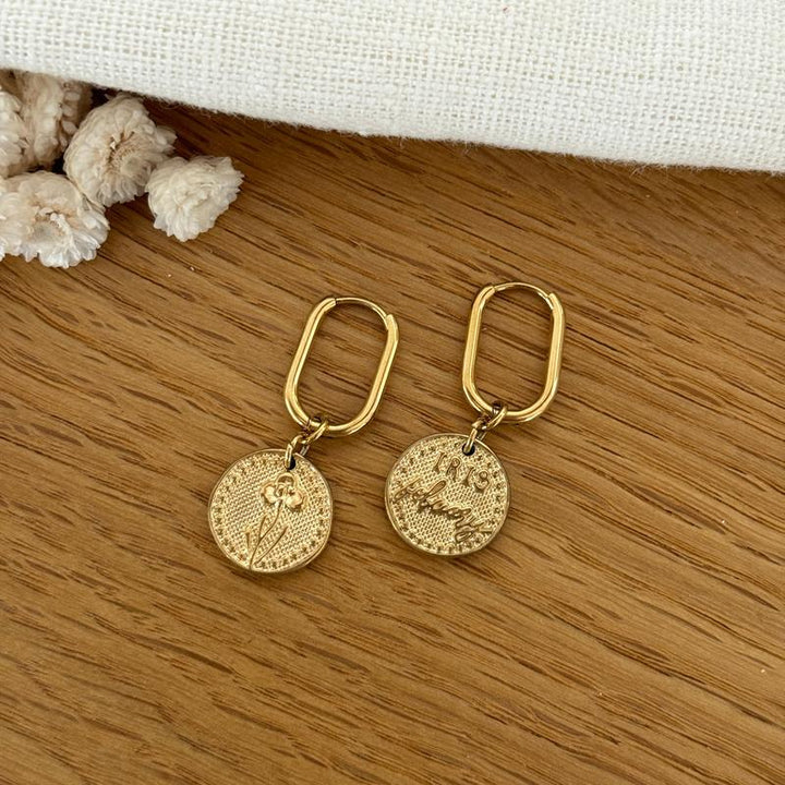 Birth flower earrings in steel