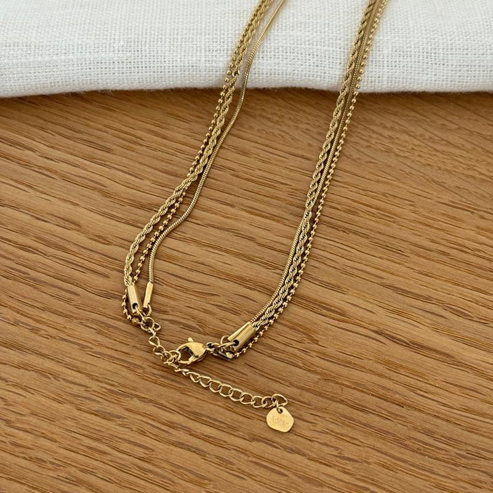 Triple-row steel necklace