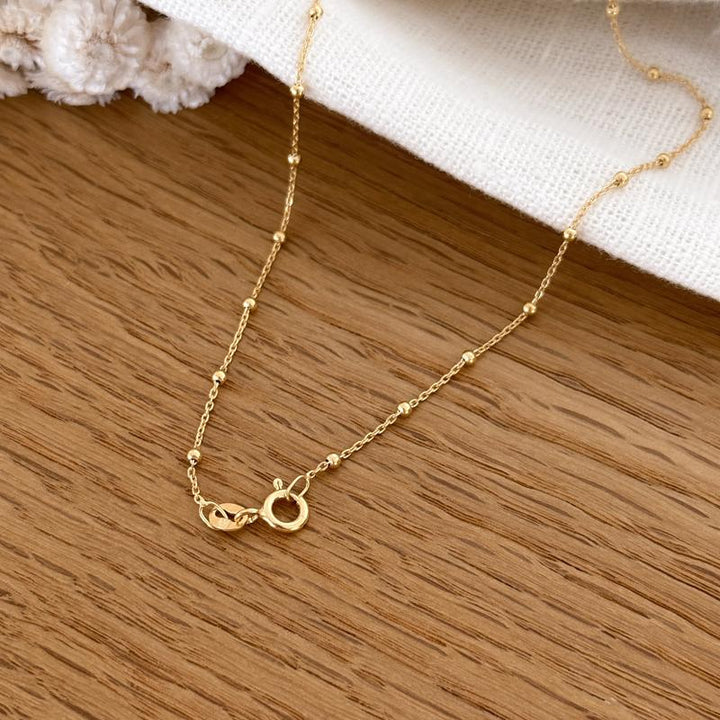 Collar «Lee» blanco chapado en oro-Collares-instants-plaisirs-Cadena de bolas deInstants Plaisirs  Joyas