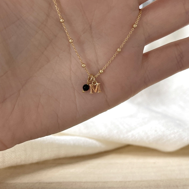 Pulsera «Ysée» negra chapada en oro-Pulsera-instants-plaisirs-Una letra + unaInstants Plaisirs Joyas