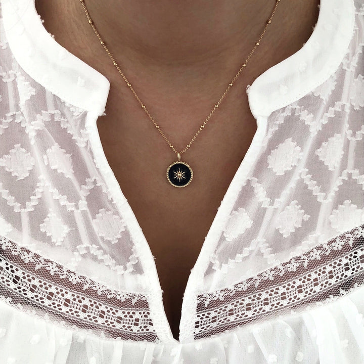 Collier "Soleil" noir plaqué or instants-plaisirs 