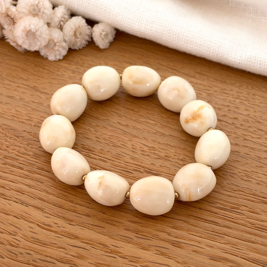 bracelet élastique perle résine beige