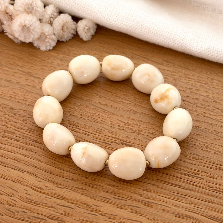 bracelet élastique perle résine beige