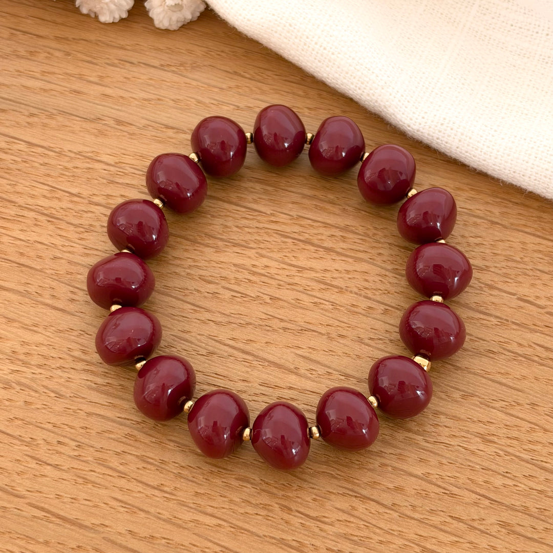 bracelet perles résine bordeaux 