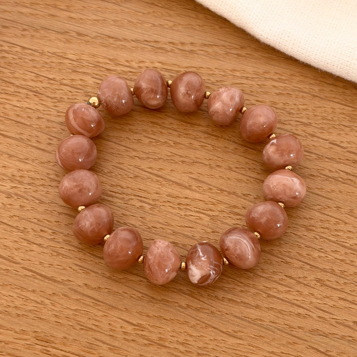 Bracelet perles de résine couleur nude parfait pour l&