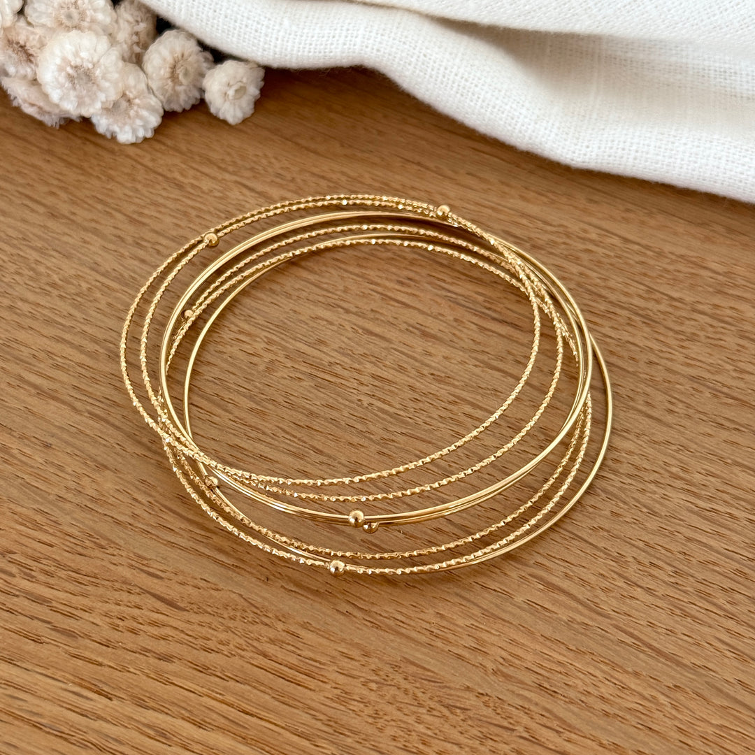 Lot de 7 bracelets mélange lisse et facetté avec une bille sur chacun